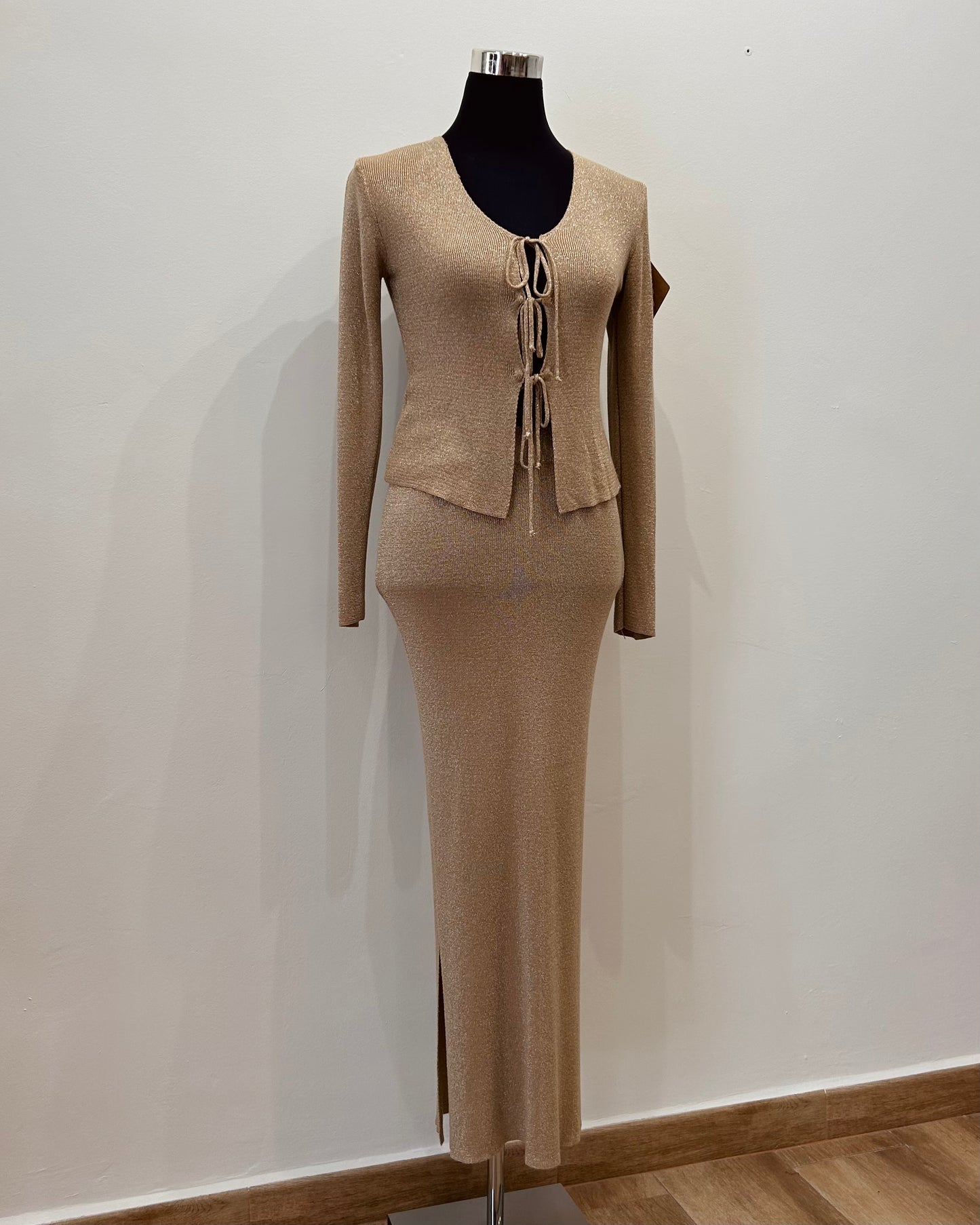 Traje de punto beige