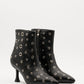 Bota negra tachuelas