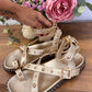 Romanas tachas doradas