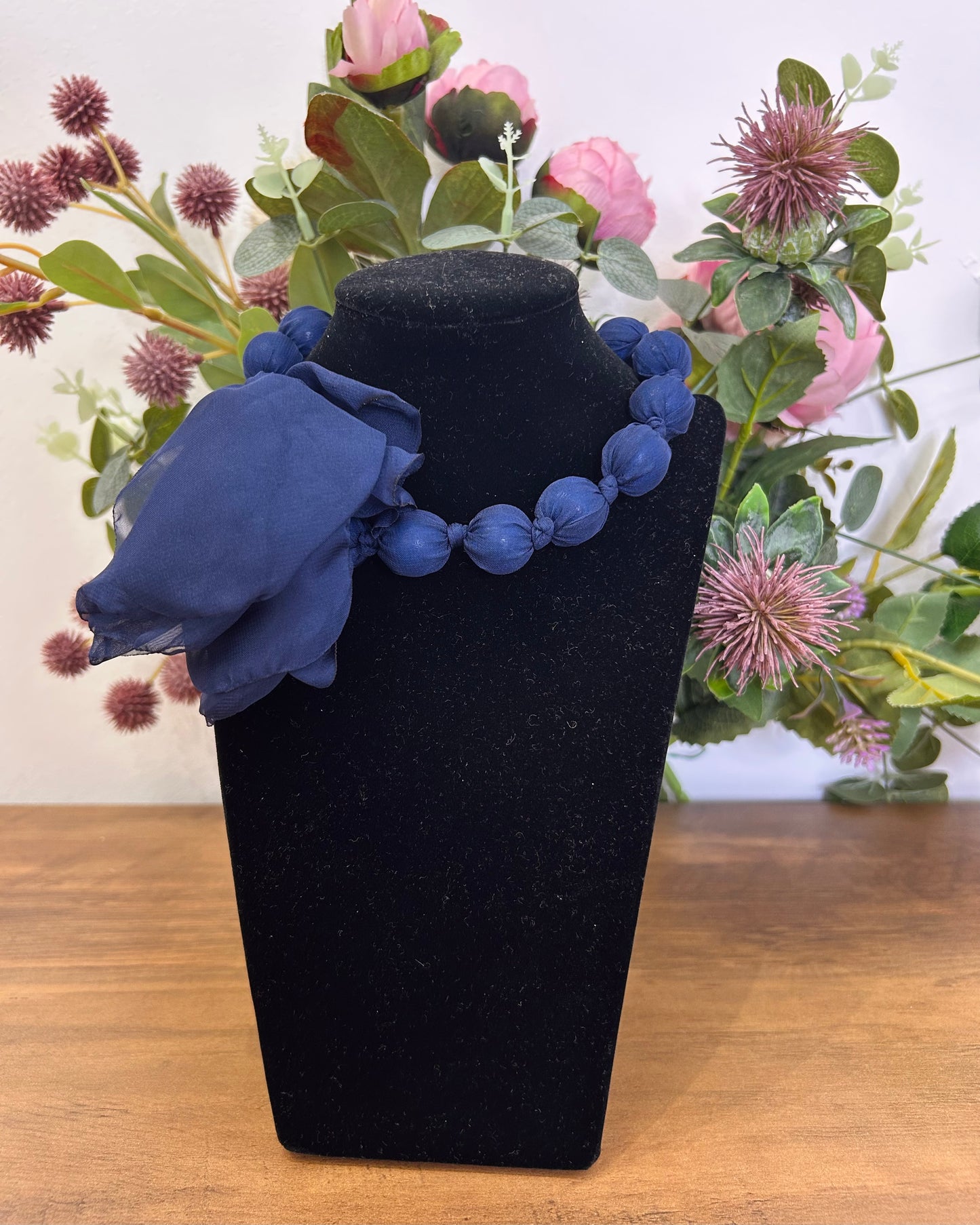 Collar bolas flor
