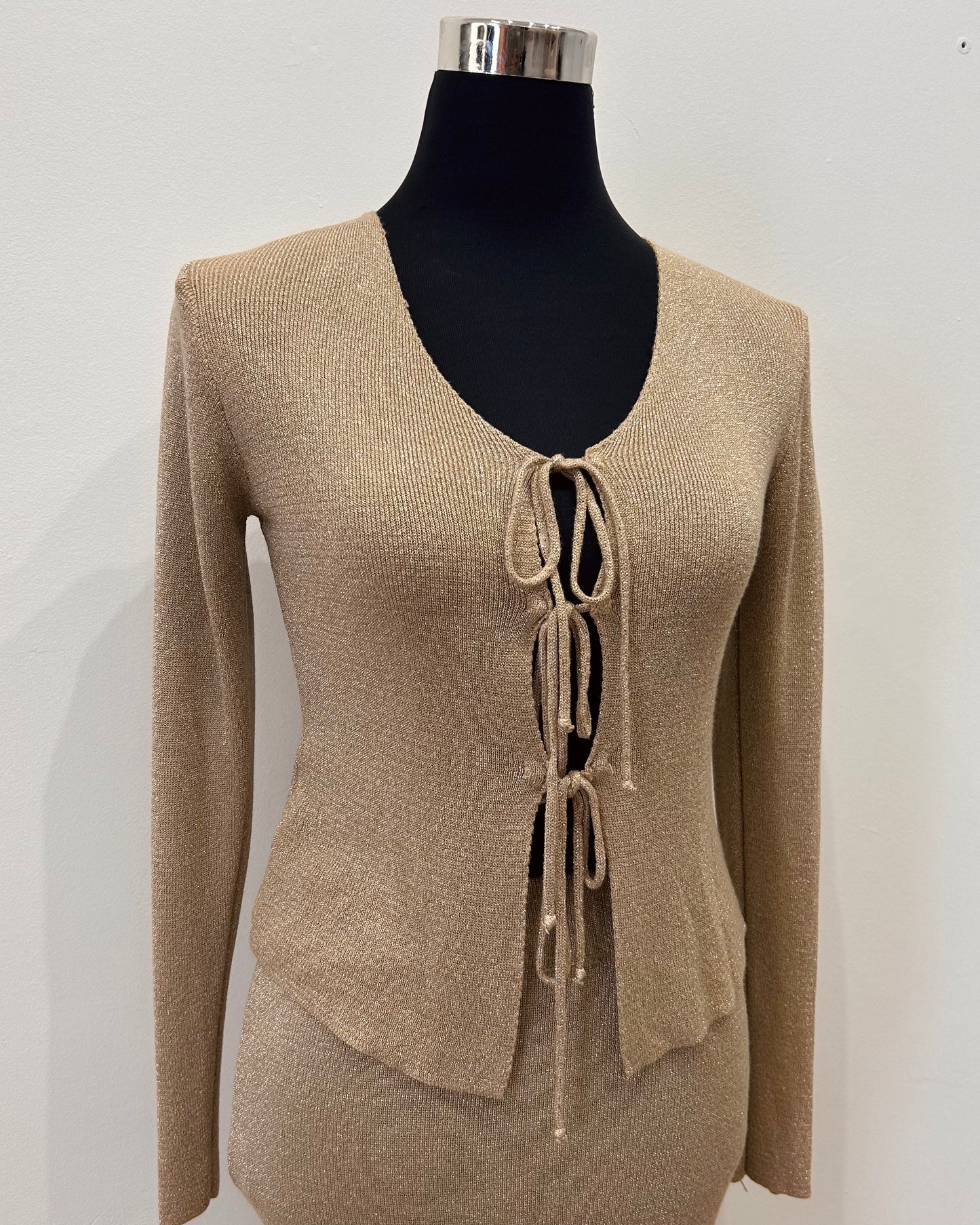 Traje de punto beige