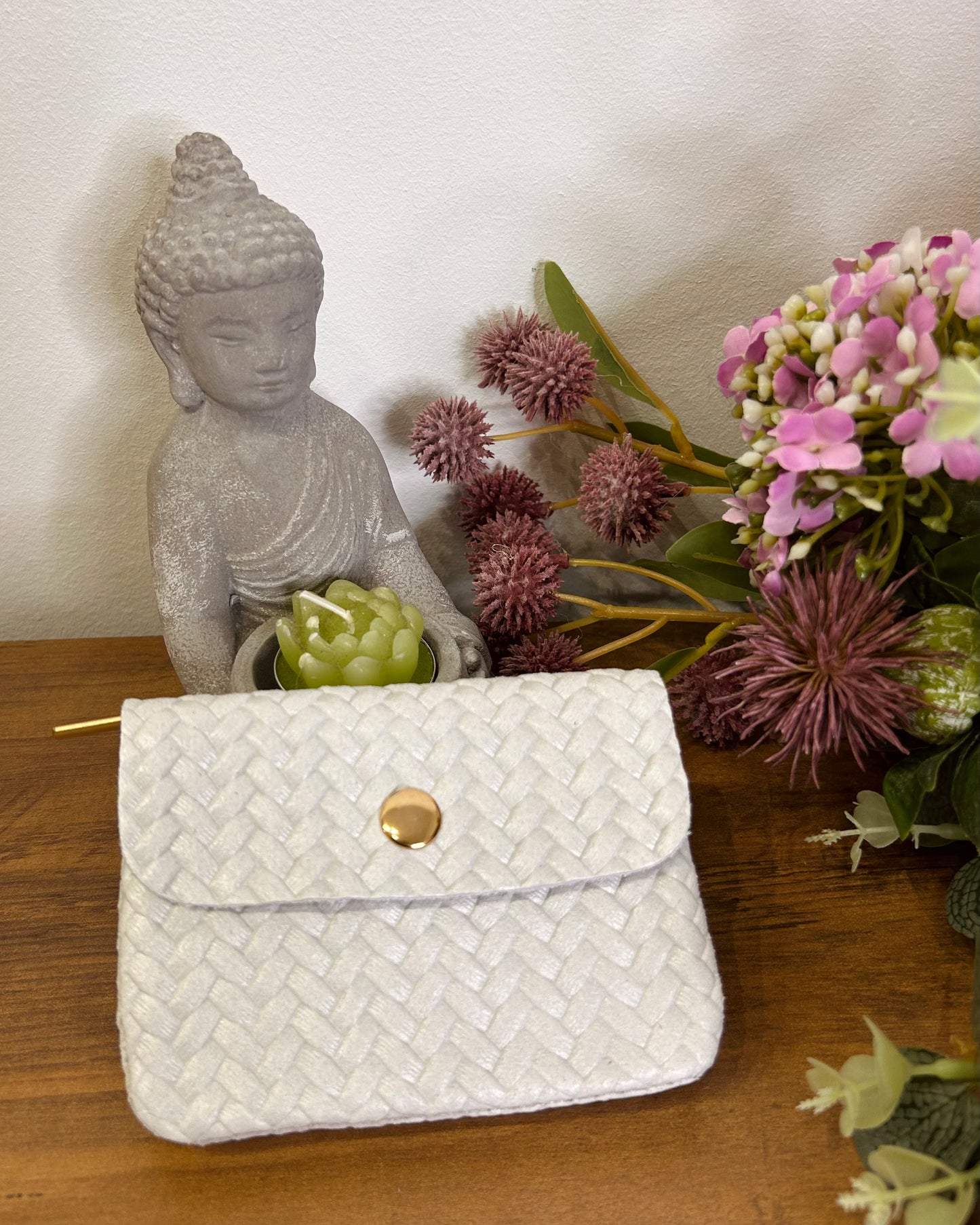 Cartera mini trenzada piel