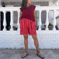 Short rayas burdeo/coral