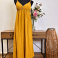 Vestido mostaza tacha