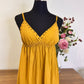 Vestido mostaza tacha
