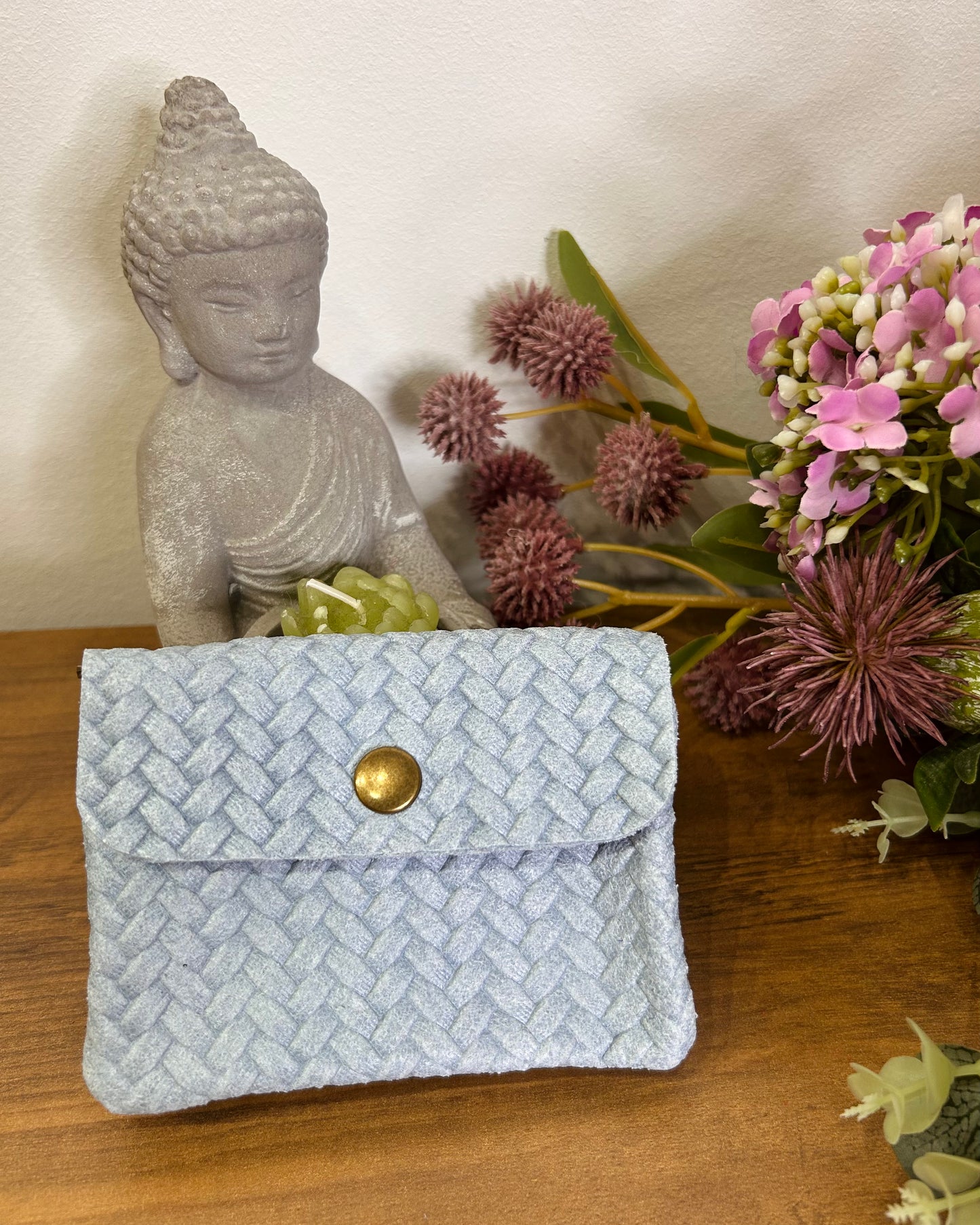 Cartera mini trenzada piel